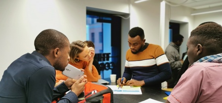 People sitting around desk