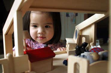 Girl Playing With A Dollhouse Ns 01546